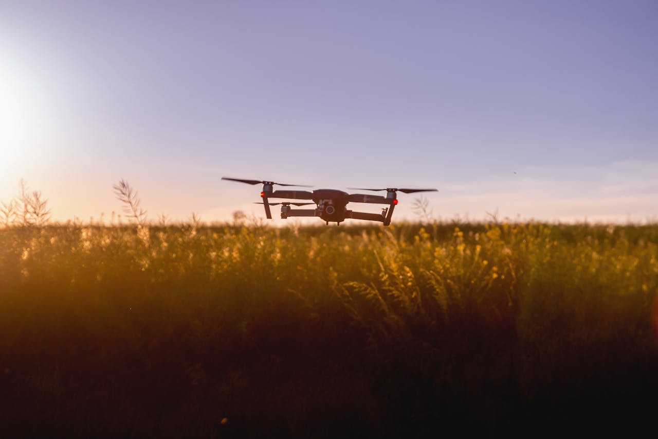 Crafting Captivating Headlines: Your awesome post title goes here A drone flies over a field during sunset, capturing stunning aerial views.